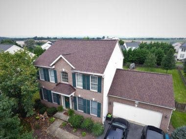Completed roof in Burnt Sienna shingles by DC Generals