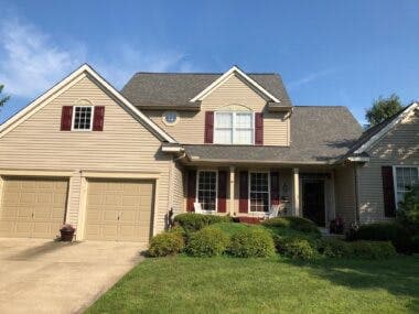 Completed roof in Driftwood shingles by DC Generals