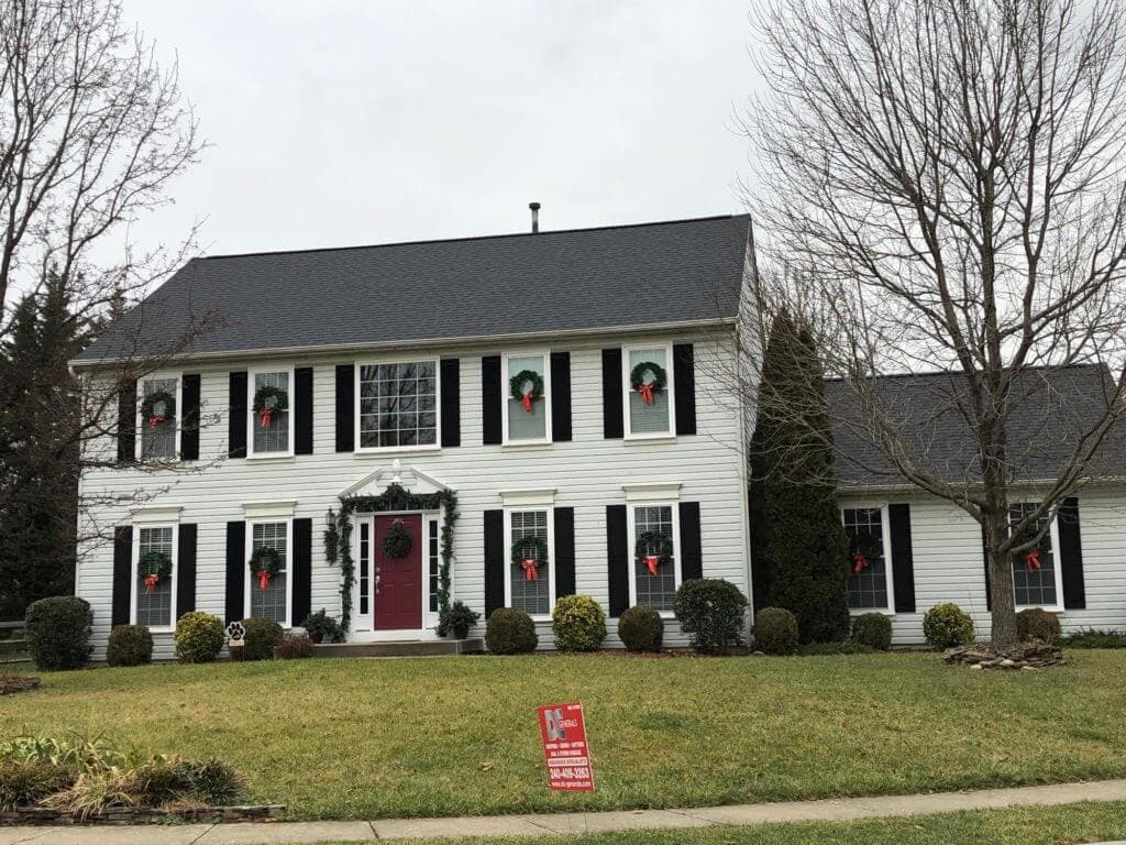 Completed roof in Moire Black shingles by DC Generals